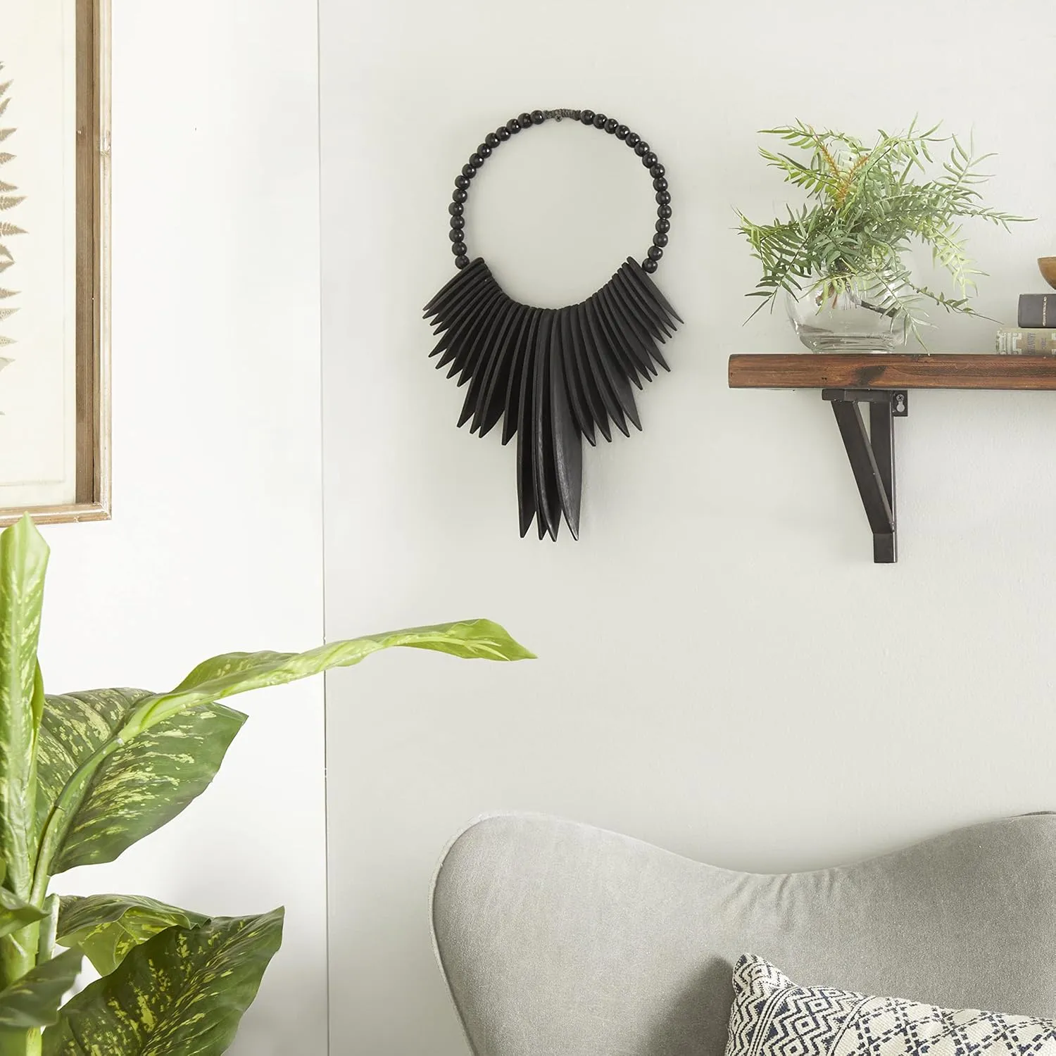 Deco 79 Wood Tribal Home Wall Decor Statement Necklace Wall Sculpture with Beaded Detailing, Wall Art 13" x 3" x 18", Black